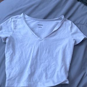 white V-neck cropped shirt
